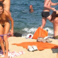 Pic #2 Beach Voyeur:&nbsp;Beach Voyeur: Smiling Stripping
