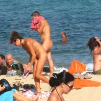 Pic #5 Beach Voyeur:&nbsp;Beach Voyeur: Smiling Stripping
