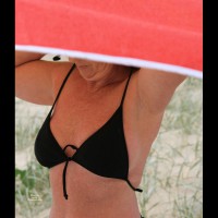 Pic #6 Topless Amateur:&nbsp;Putting On Bikini Top...