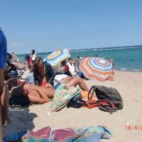 Pic #2 Topless At The Beach