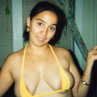 Pic #2 Showing Off Her Ass And Titties