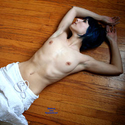 Topless Short Hair On The Floor - Dark Hair, Lying Down, Nipples, Short Hair, Showing Tits, Skirt, Small Tits