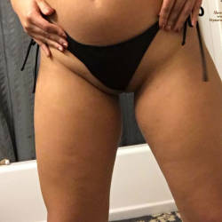 Pic #3 Changing Out Of Her Bikini
