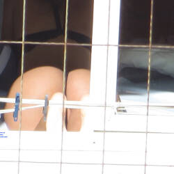 Pic #4 Pussy Slip Sunbathing Home - Voyeur