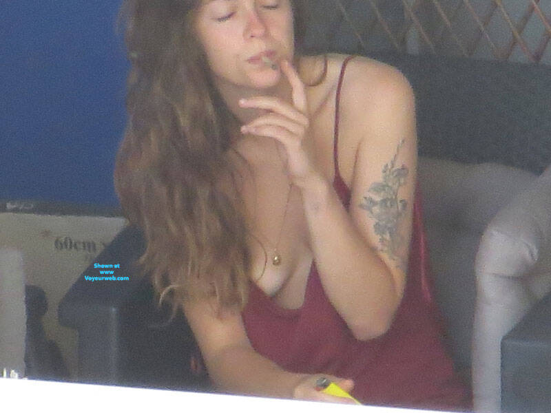ooops nip slip get spotted , From My Airbnb Appartment I Saw This Chicks Having A Cigarettes On Her Balcony, She Seems To Have No Bra Under Her Dressing Gown So I Took My Camera And Zoom To Check If I Could See Some Nip Slip And Wait... What A Surprise When She Stand I Could See She Had No Panties Either