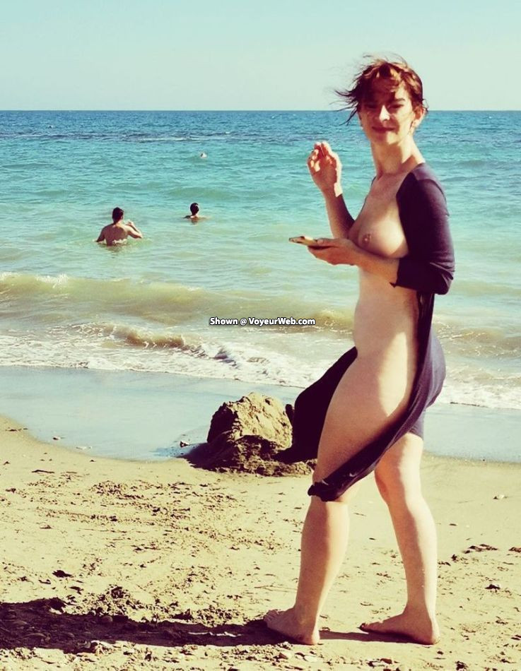 Dora's back (and more) , As Many Of You Know From The Past, My Wife Loves To Get Naked, Either At Home Or Outdoors. It Also Happens, Though Not Often, That She Dares To Show Herself Naked In A Public Place. Sometimes It's Only For A Moment, When She Takes Off Her Bathing Suit To Swim Freely In The Sea, Then Comes Out Onto A Non-nude Beach And Shows For A While Her Whole Body To Strangers. Other Times, She Undresses When She Feels Comfortable And Confident Among The Friends We Spend Our Holidays With. When Others Are Dressed, She Goes Topless - When Other Women Also Take Off Their Bras, She Pulls Down Her Panties. She Just Likes To Be The Only One Naked, I Think. :)Maybe It's Time To Show Her Body To You Again? Recently, I Found And Collected In One Folder Several Photos From Different Years And Places, Where She Was Revealing Her Nudity In Front Other People. And I Don't Know When She Was Sexier: When She Had A Fit, Slim Figure, Or When She Gained A Bit Of Flesh And Her Curves Become More Prominent. Which Dora Do YOU Prefer? :)