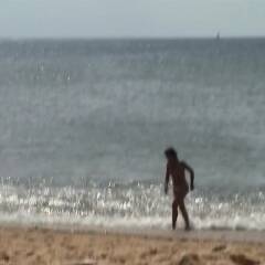 Proudly Showing her Nips on Public Beach