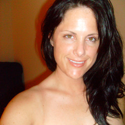 Pic #6 Jennifer taking off her bra.