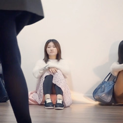 Pic #2 Sitting there without knowing she's showing her white panties to everyone (Part 2)