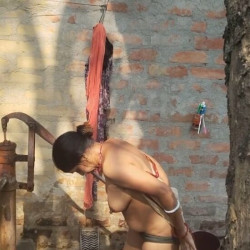 Pic #2 Neighbor's wife taking bath