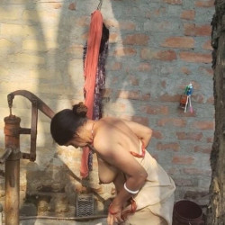 Pic #5 Neighbor's wife taking bath 2