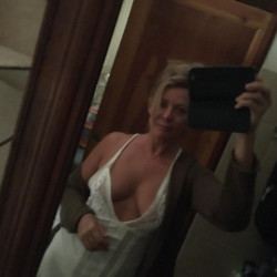 A nice selfie series of Emanuela in her white nighty.
